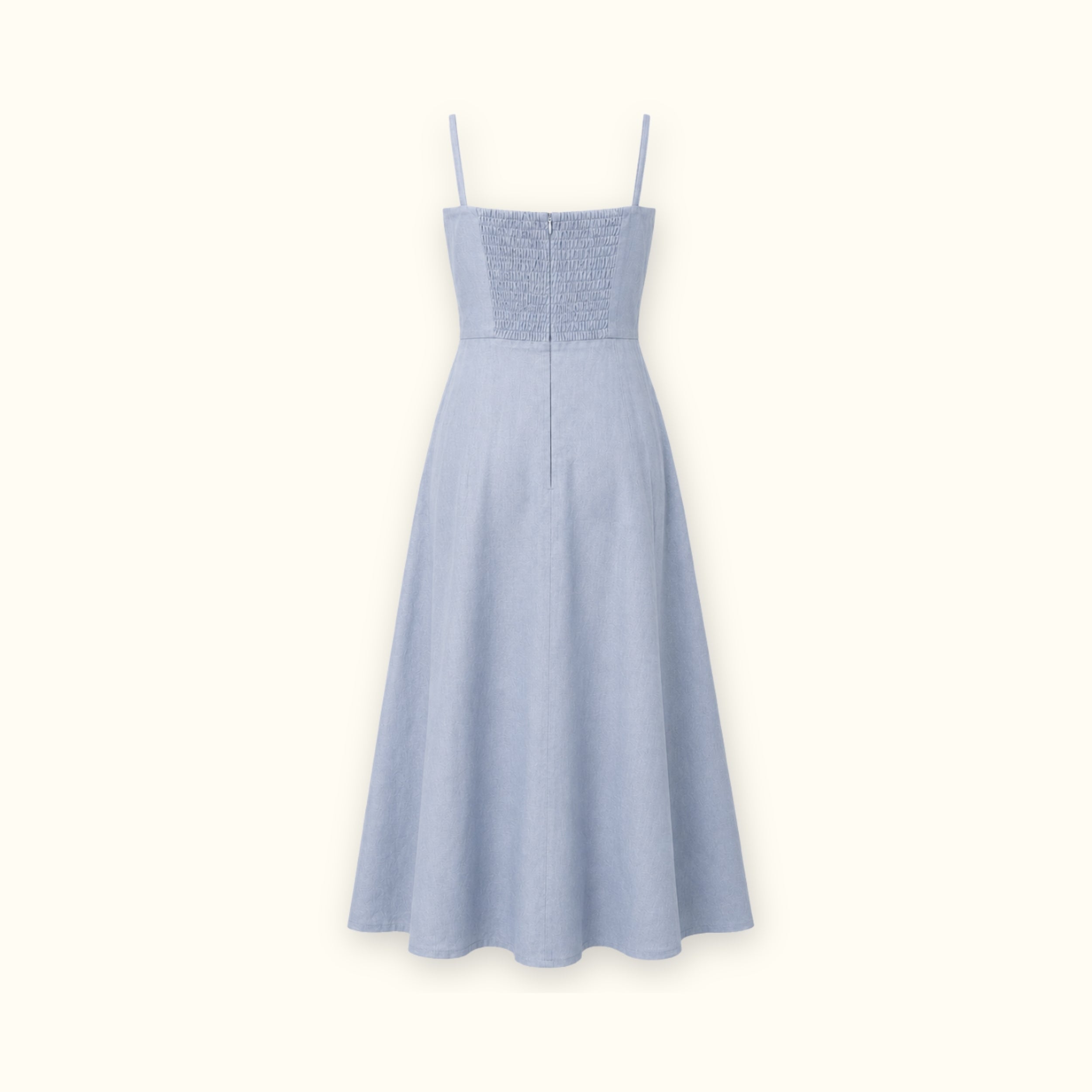 Vestido midi de lino en azul claro, vista trasera, mostrando el escote y la silueta del vestido