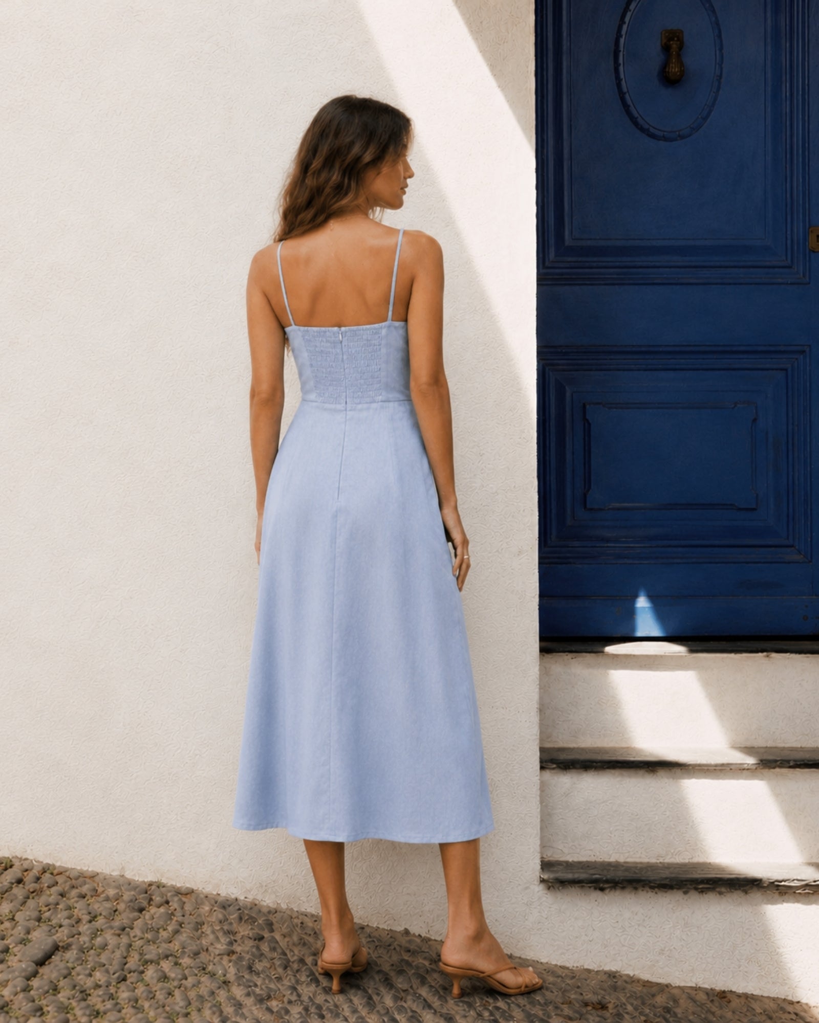Linen Midi Dress in Light Blue, lifestyle view 4, showing neckline and dress silhouette
