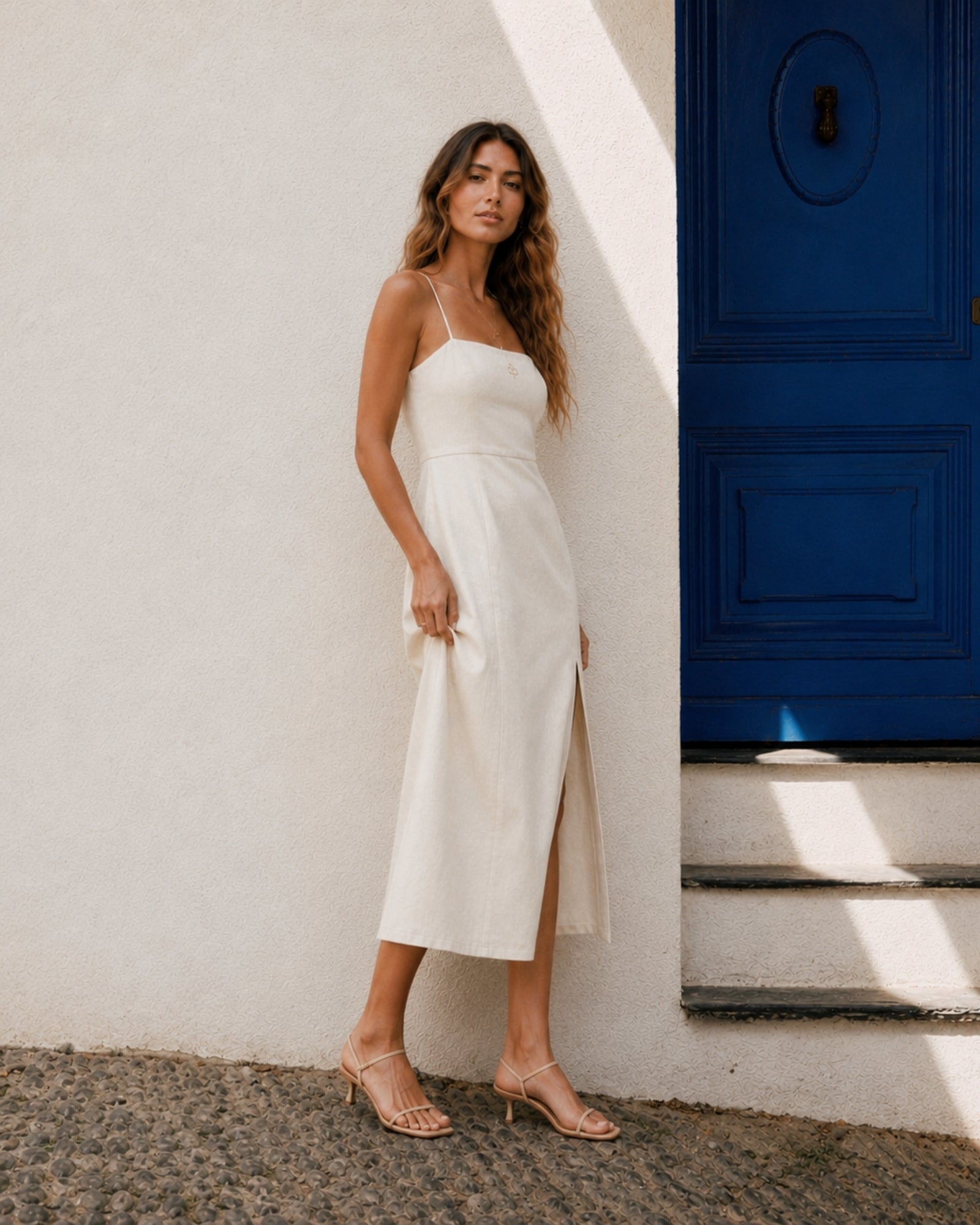Linen Midi Dress in Off White, lifestyle view 1, showing neckline and dress silhouette