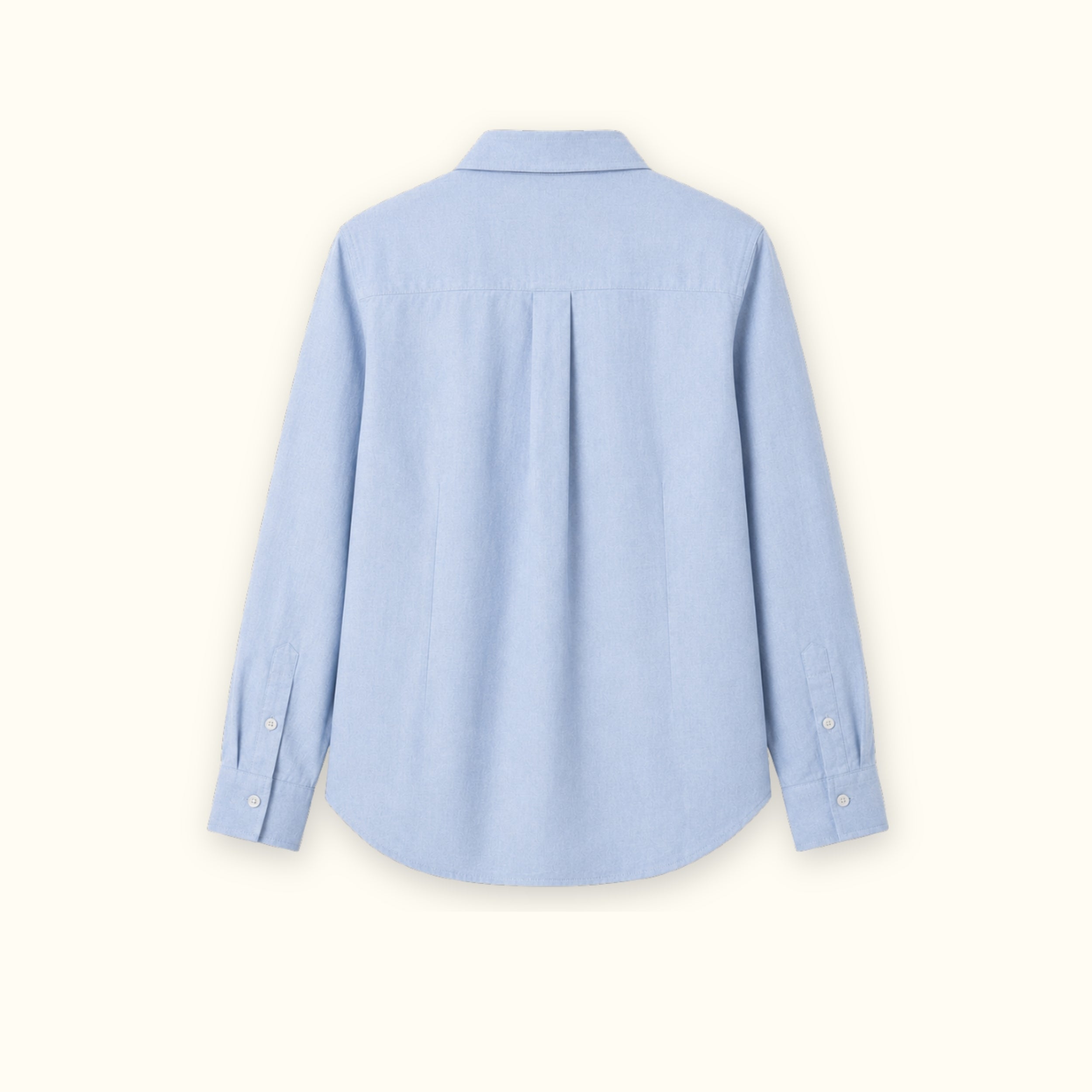 Camisa de lino regular fit en azul claro, vista trasera, mostrando el cuello, el bajo y la confección relajada