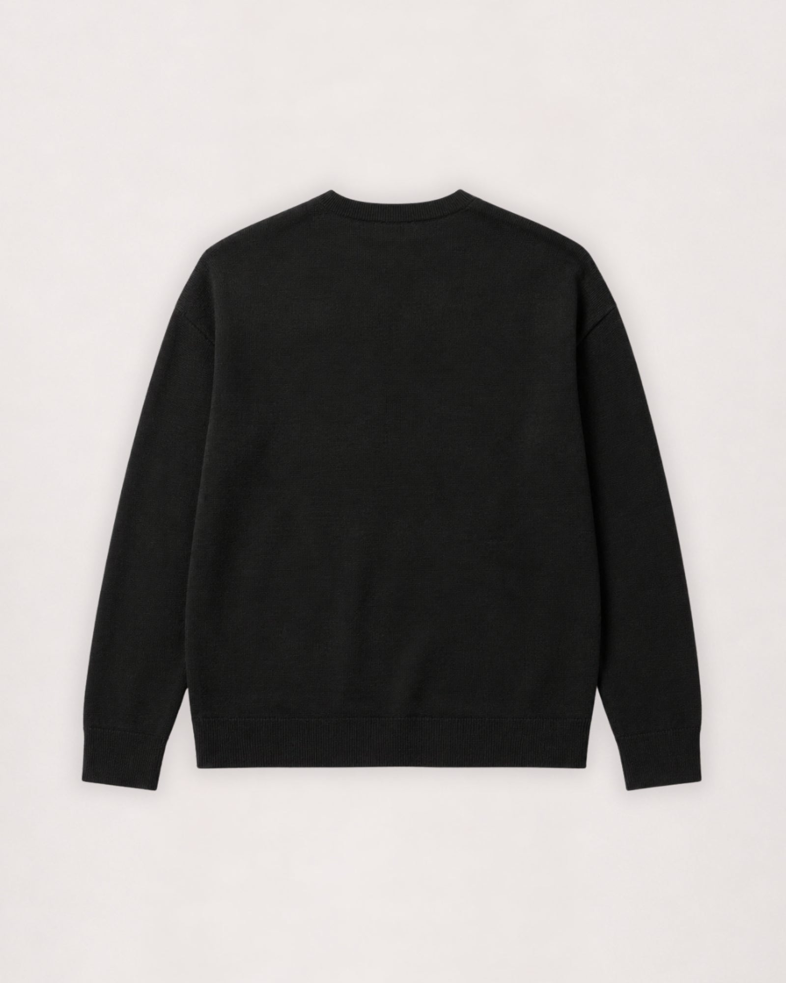 Pull à col rond en laine mérinos noir, vue à plat de dos