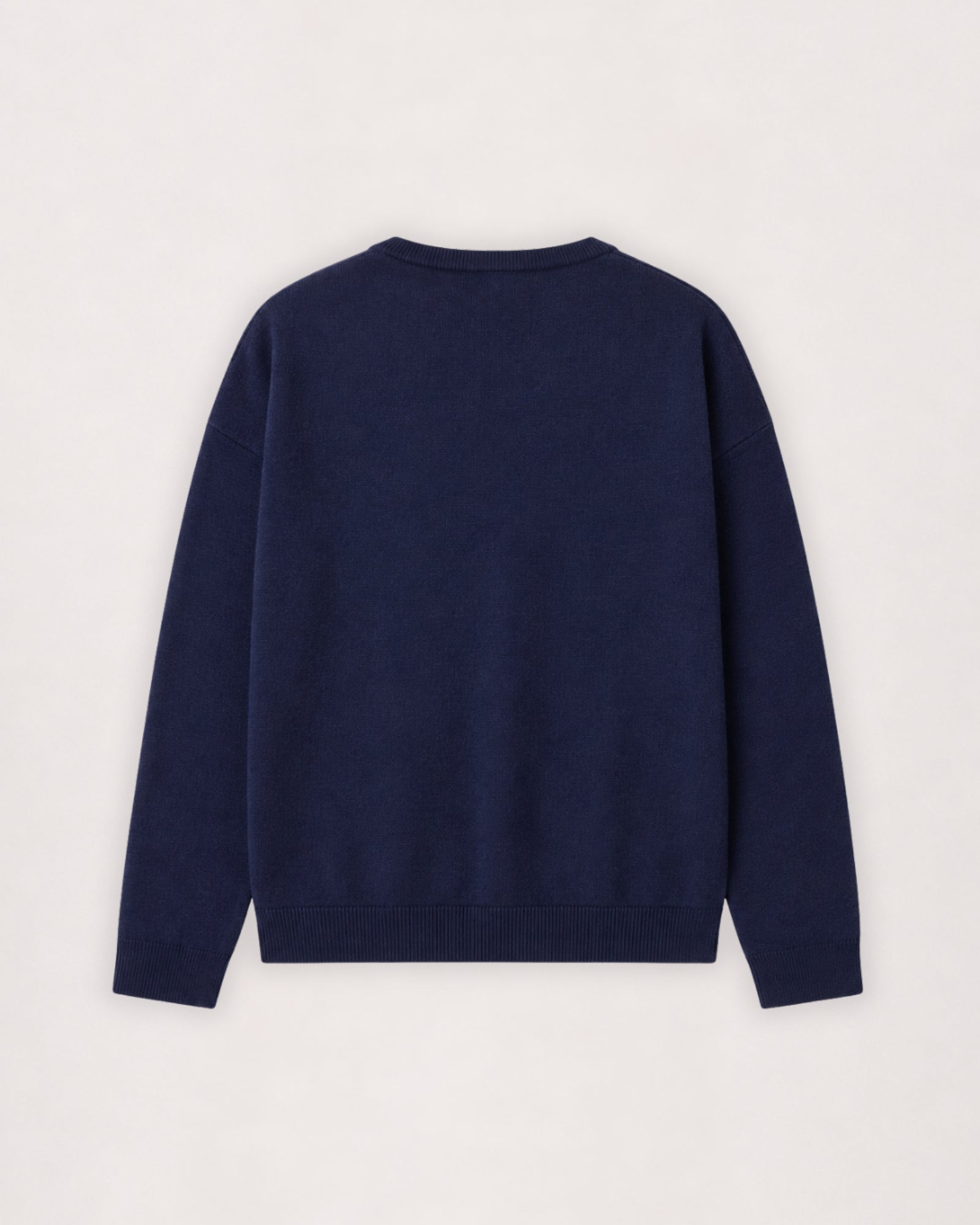 Pull à col rond en laine mérinos bleu marine, vue à plat de dos