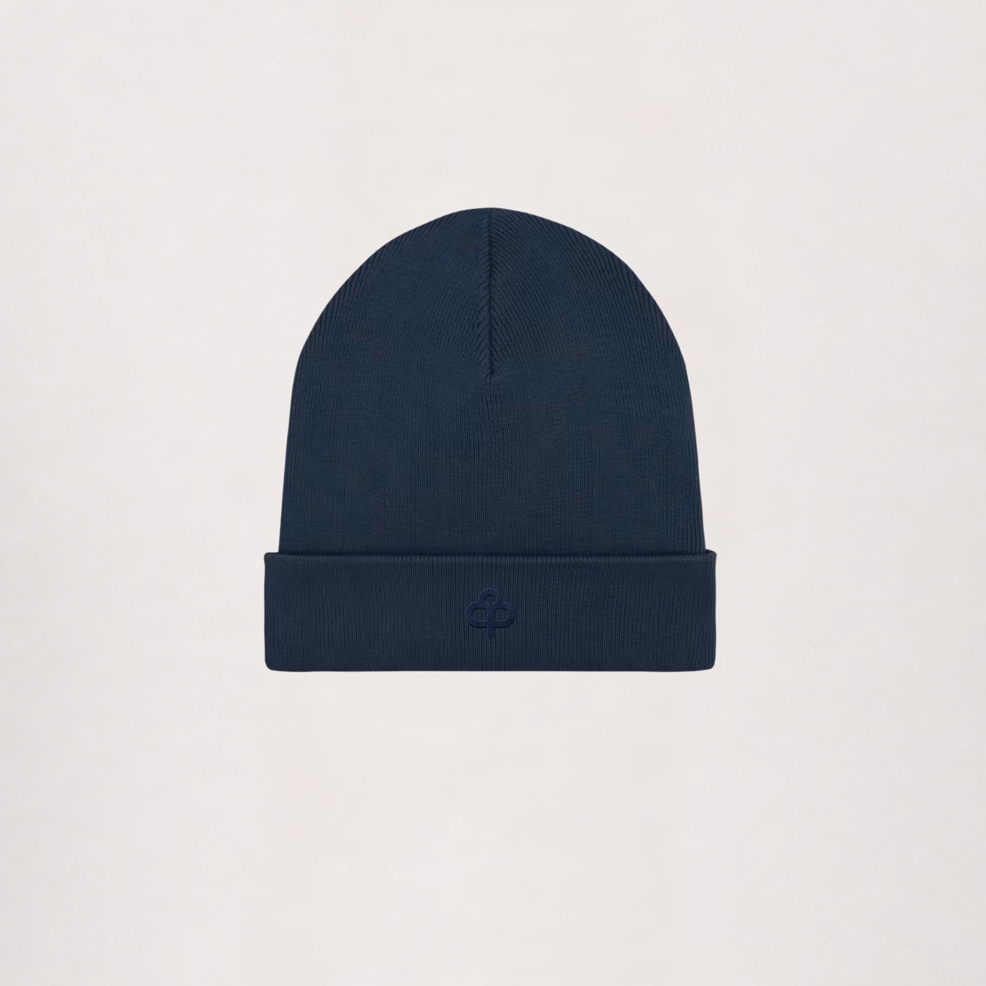 Ribbed beanie in navy, flat lay with turn-up cuff and embroidered logo