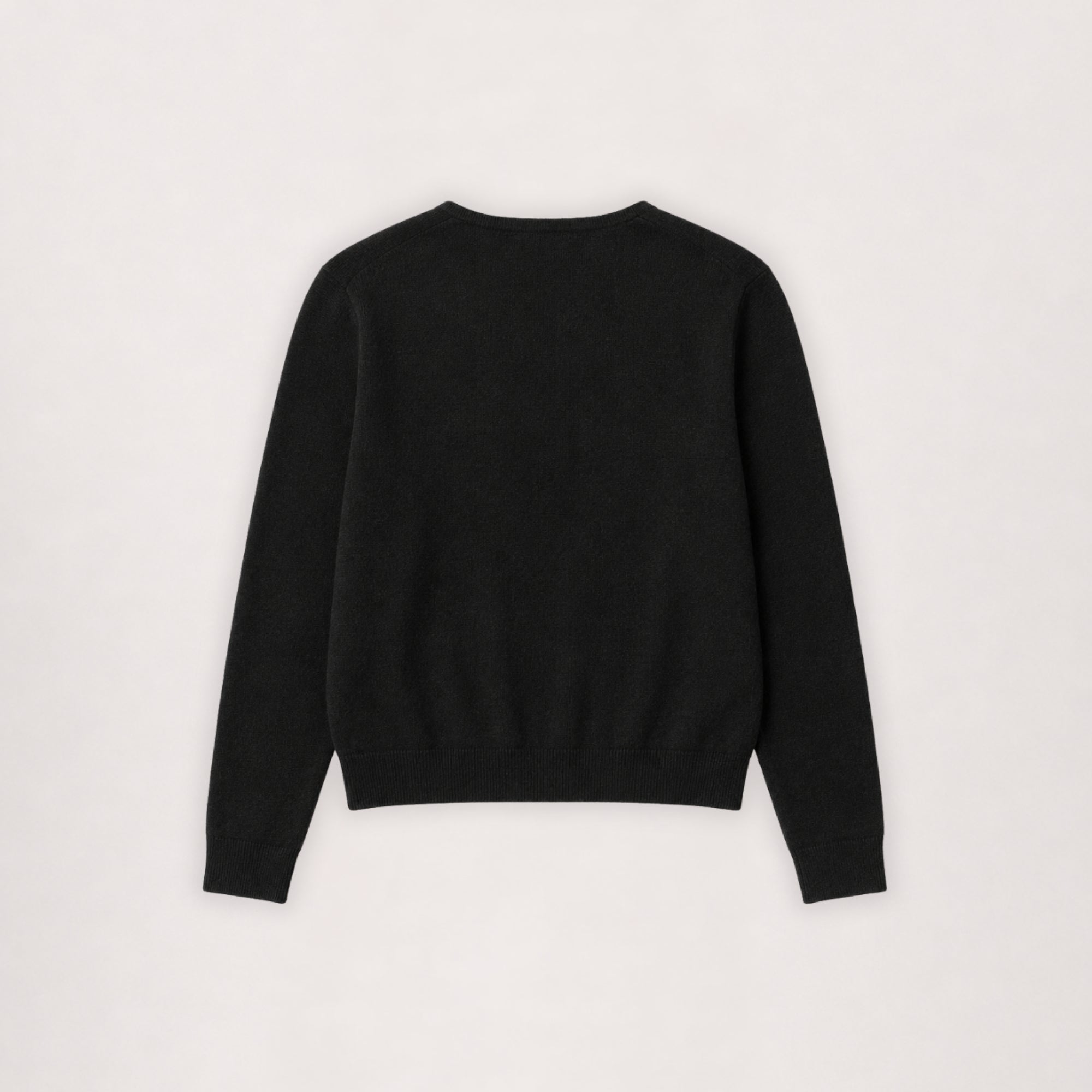 Merino cardigan in black, flat lay back view