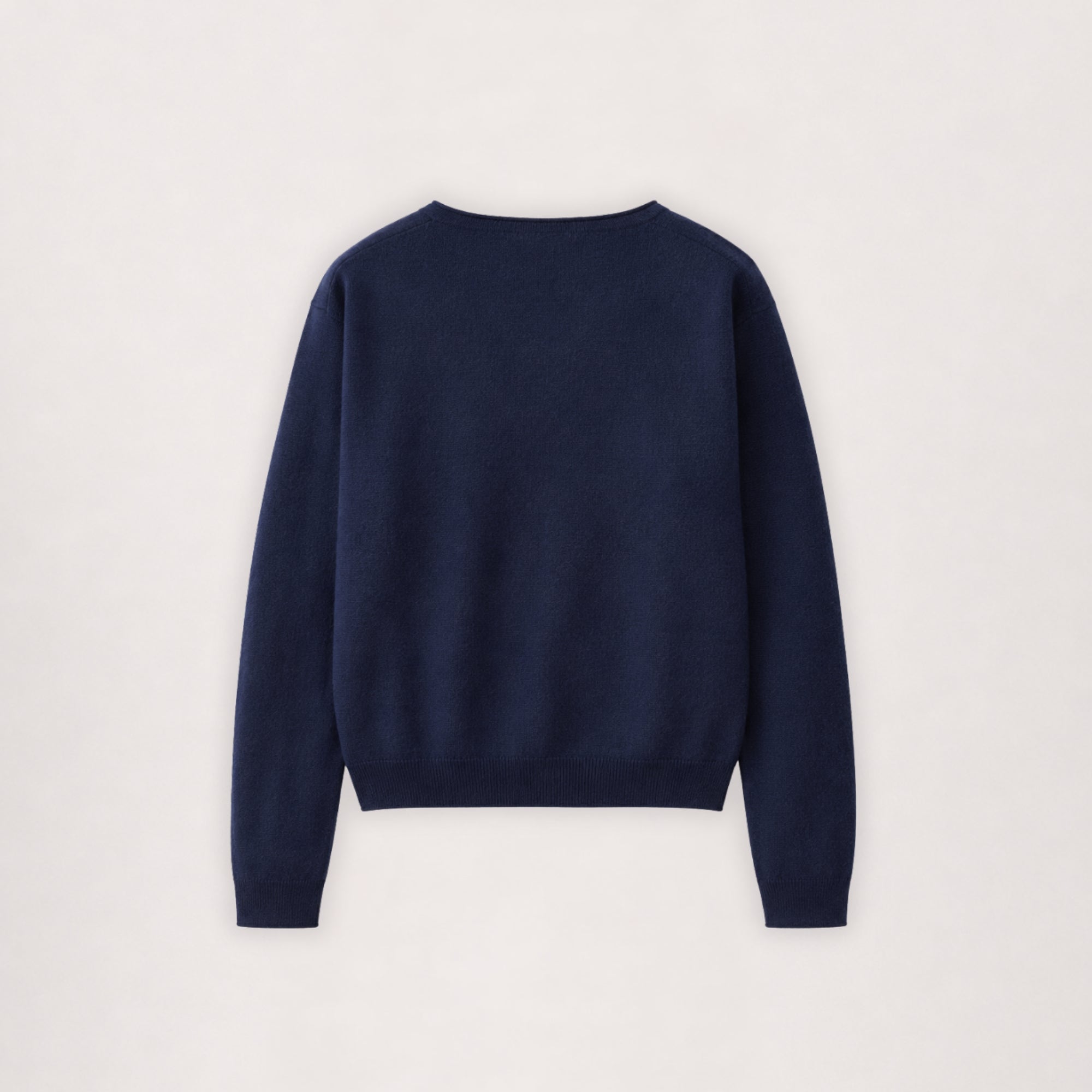 Merino cardigan in navy, flat lay back view