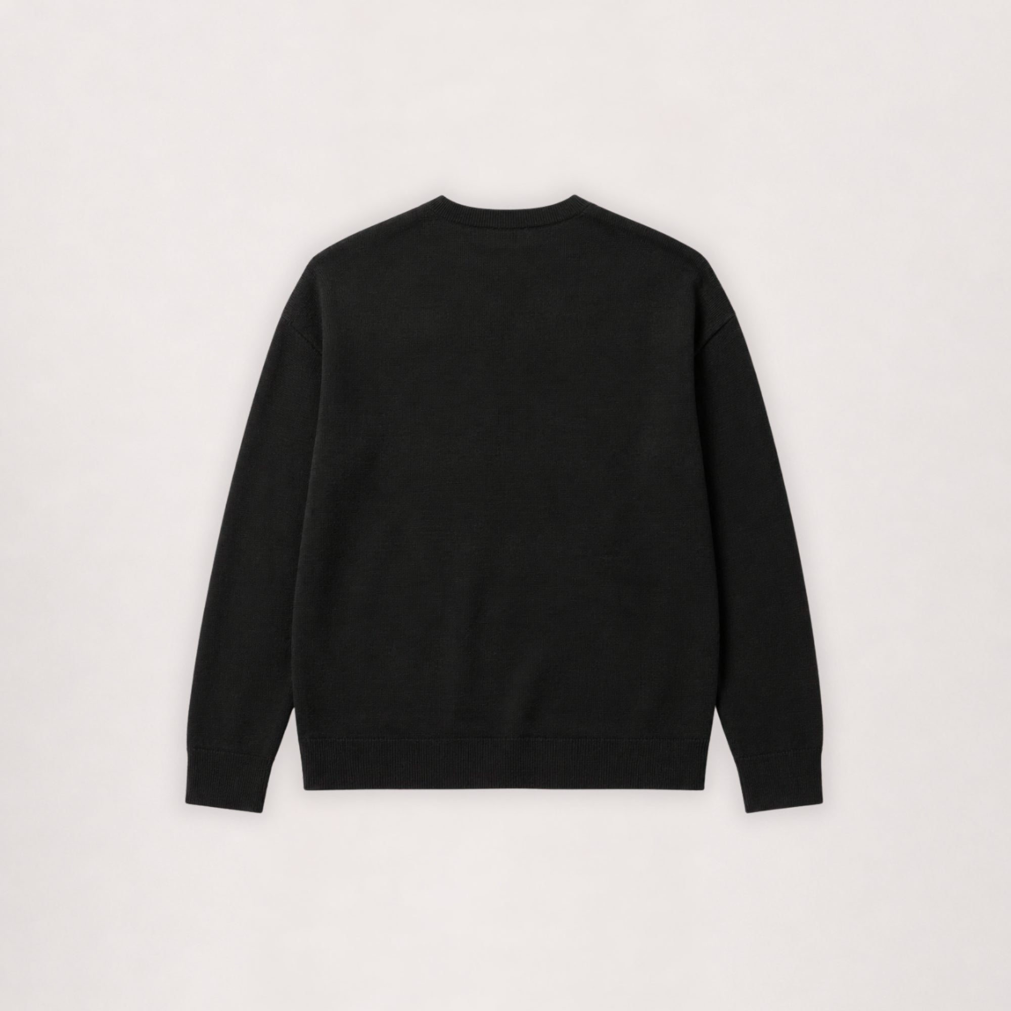 Pull à col rond en laine mérinos noir, vue à plat de dos