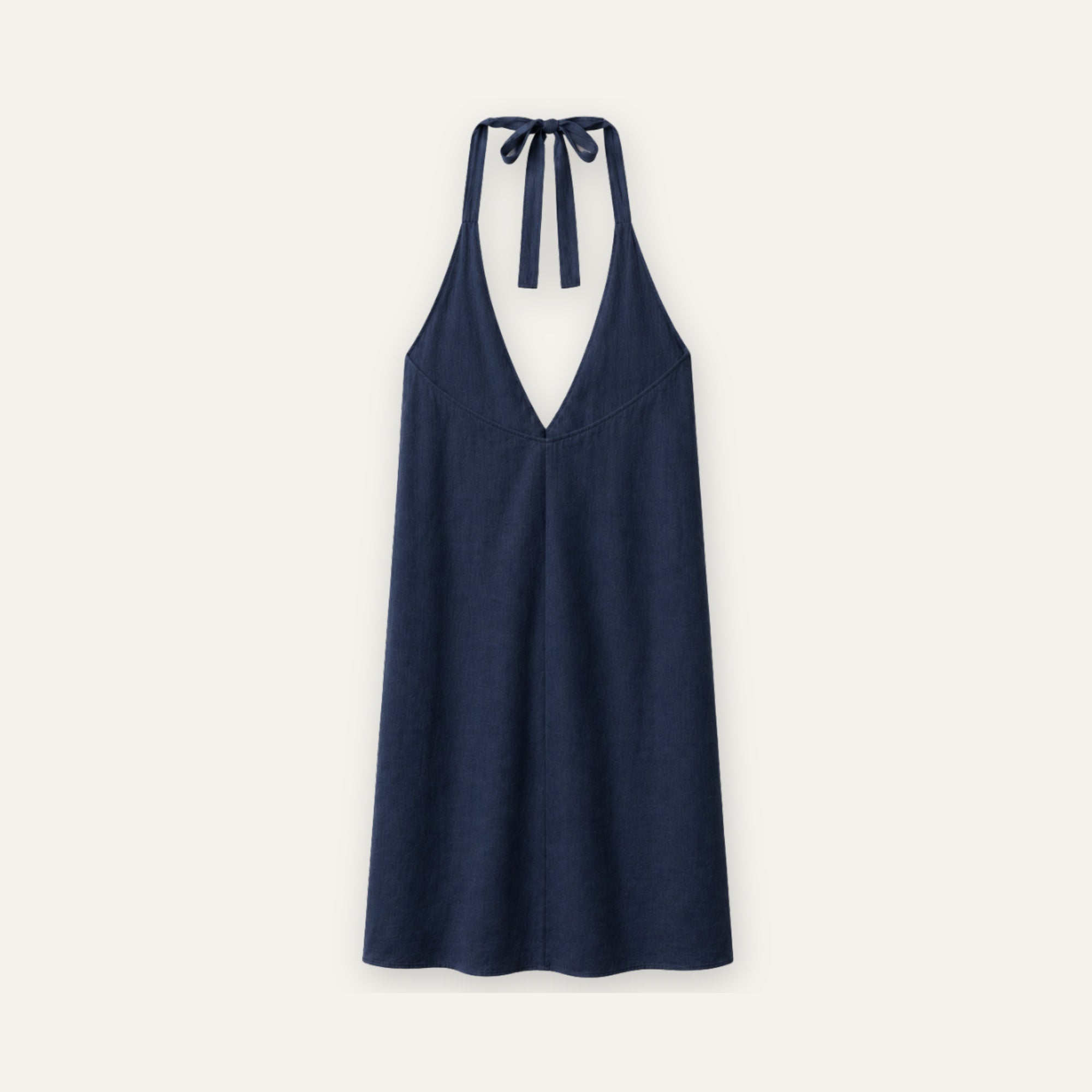 Vestido halter de lino en azul marino, vista trasera, mostrando el escote y la silueta del vestido